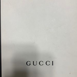A pair of kid Gucci shoes size 33 worn twice not even asking half the price.